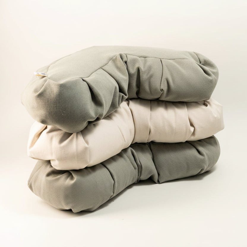 stack of meditation cushions